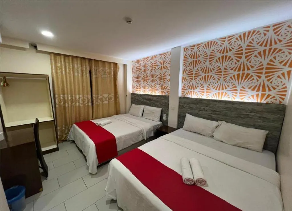 Bed in Hotel Grand Mutiara