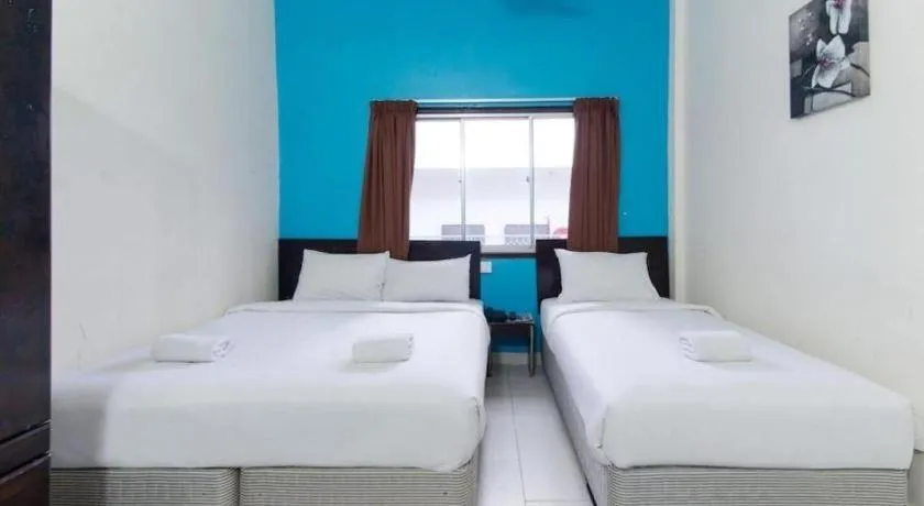 Bed in Hotel Grand Mutiara