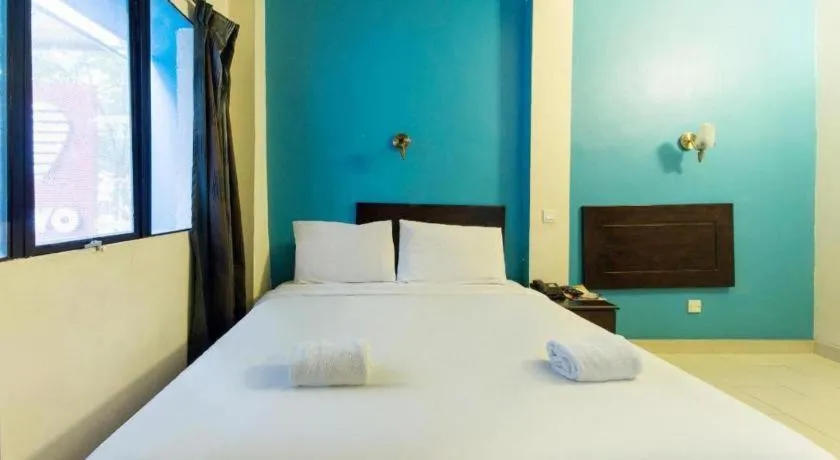 Bed in Hotel Grand Mutiara