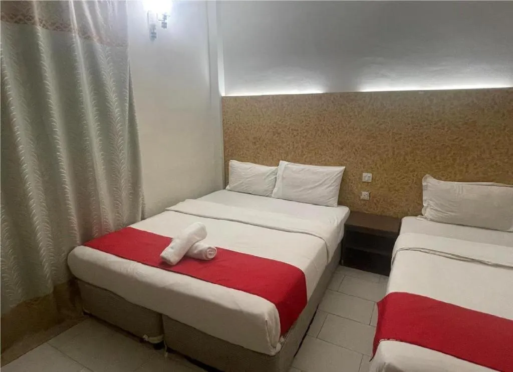 Bed in Hotel Grand Mutiara