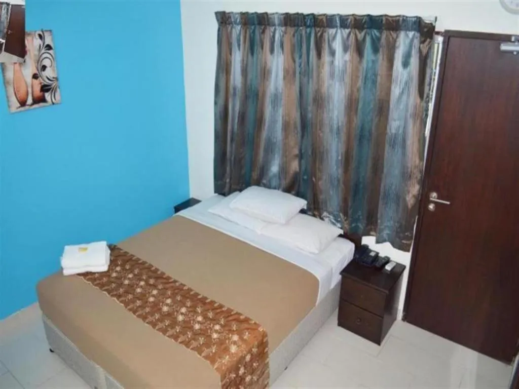 Bed in Hotel Grand Mutiara