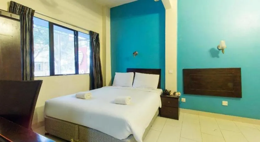 Bed in Hotel Grand Mutiara