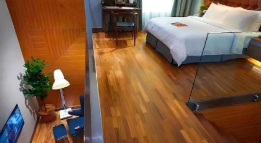 Bed in Kingwood Boutique Hotel