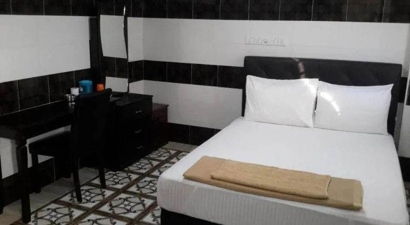 Bed in Kota Damansara Boutique Hotel