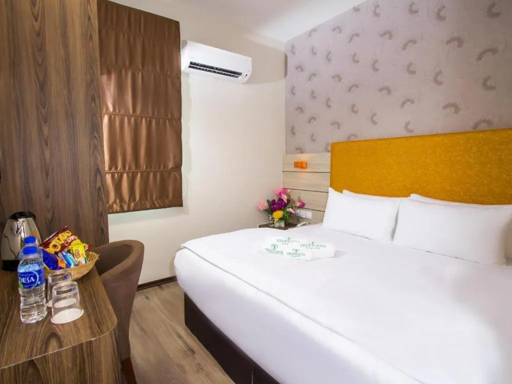 Bed in Tropicana Boutique Hotel