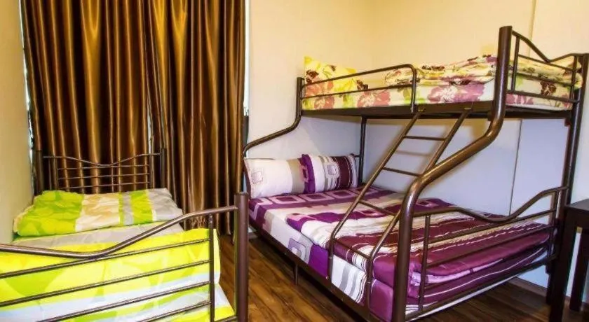 Bed in Tropicana Boutique Hotel