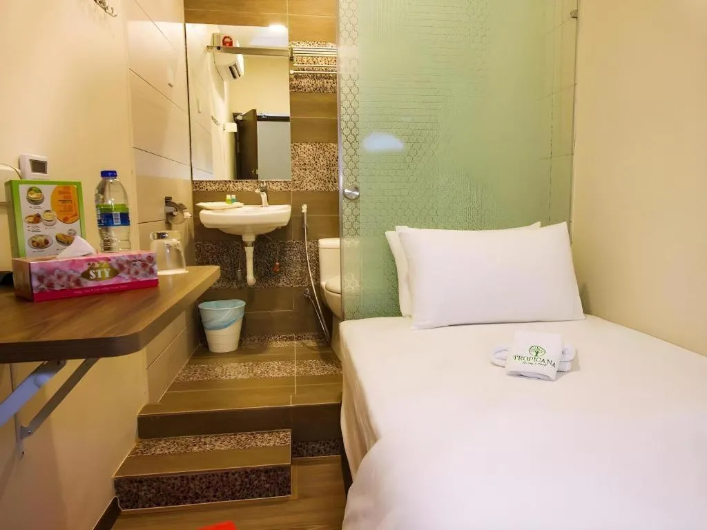 Bed in Tropicana Boutique Hotel