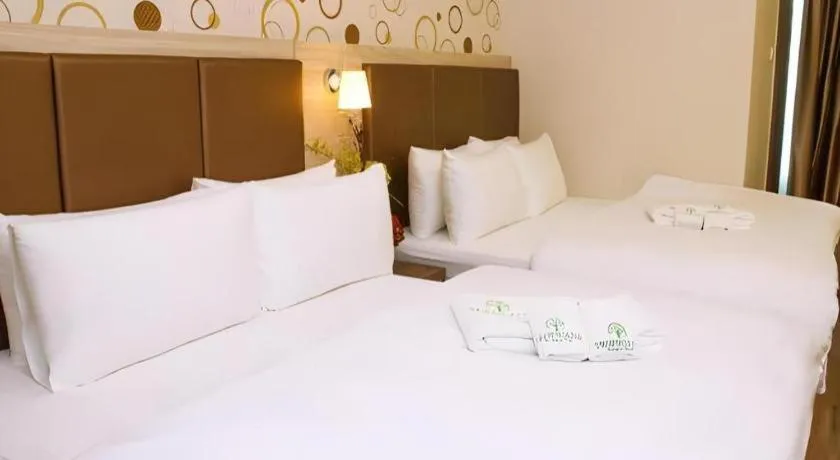 Bed in Tropicana Boutique Hotel