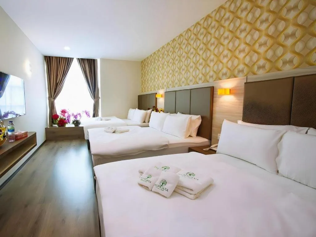 Bed in Tropicana Boutique Hotel