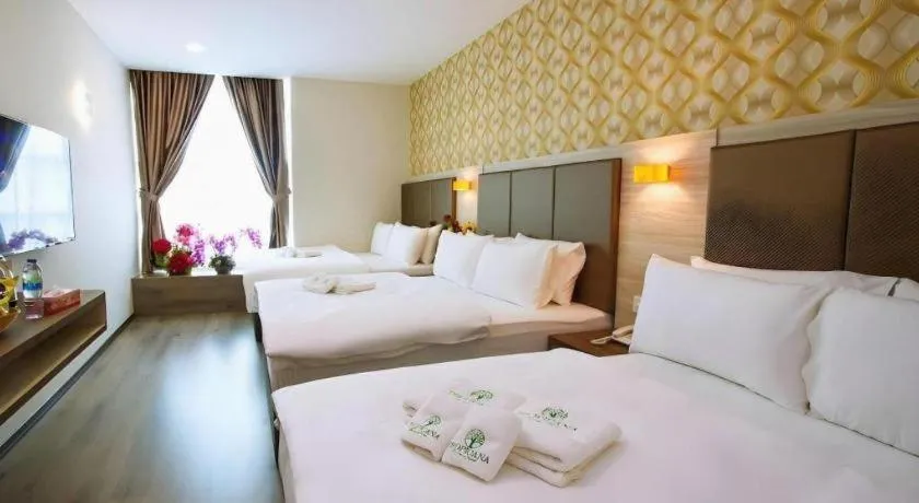 Bed in Tropicana Boutique Hotel