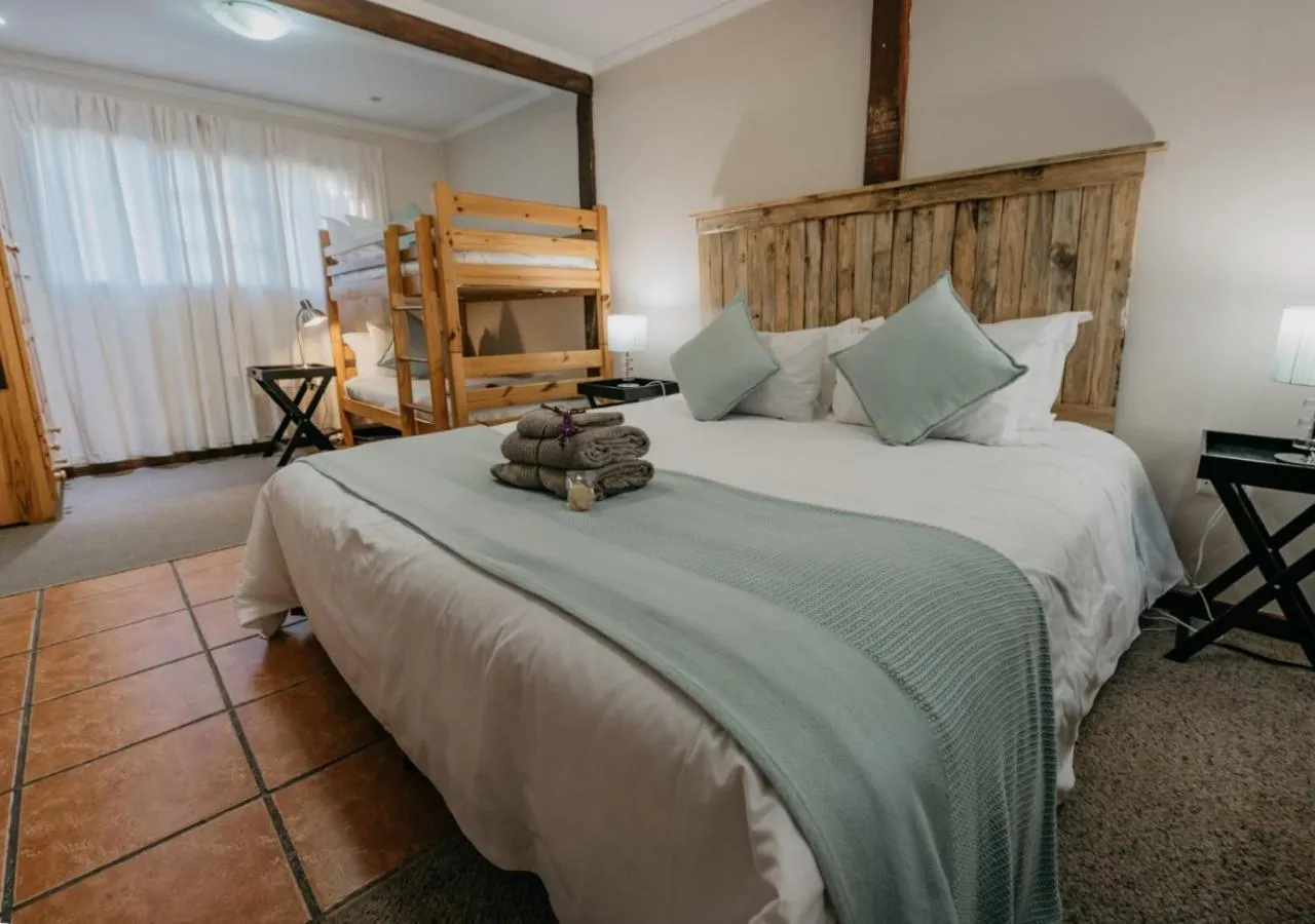 Photo of the whole room, Bed in The Village Lodge