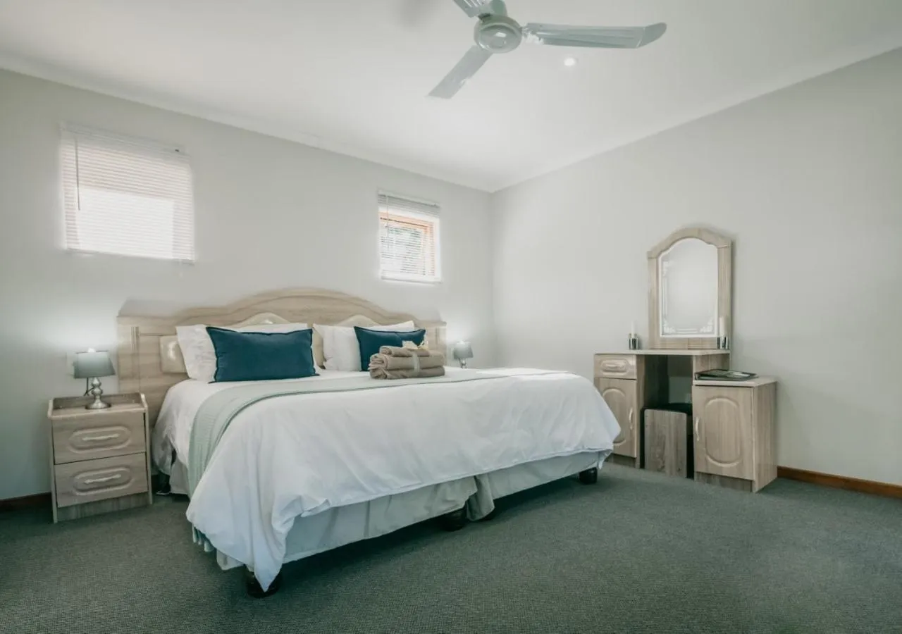 Photo of the whole room, Bed in The Village Lodge