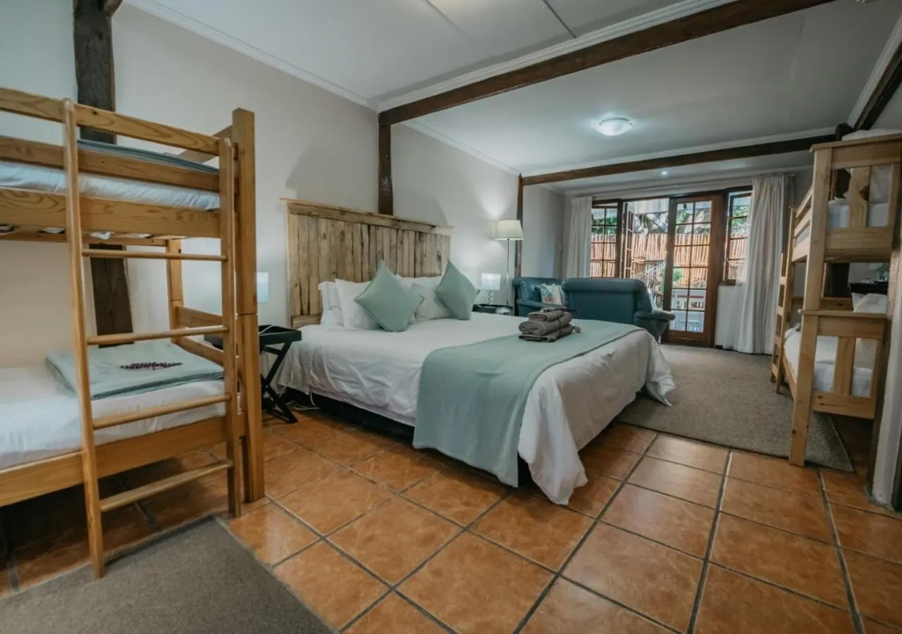 Photo of the whole room, Bed in The Village Lodge