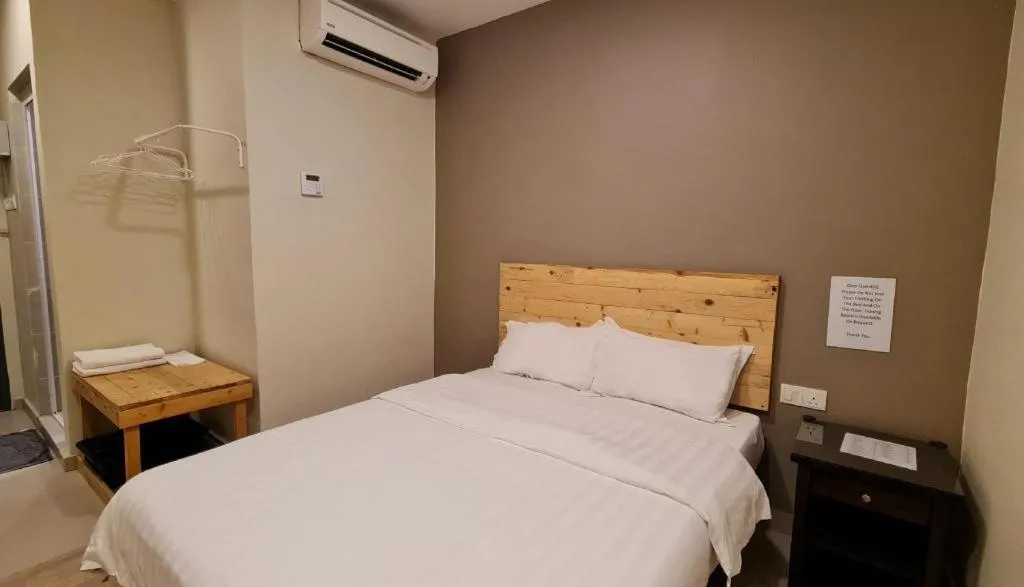 Bed in Sg. Paka Hotel