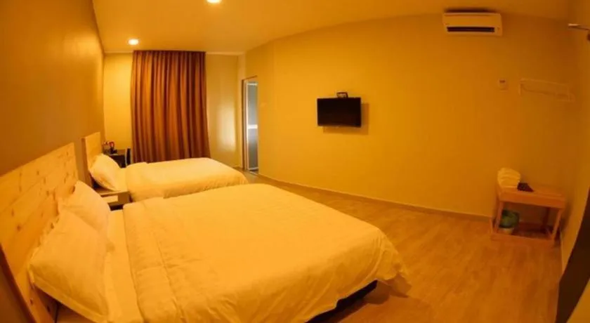 Bed in Sg. Paka Hotel