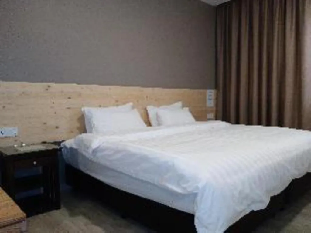 Bed in Sg. Paka Hotel