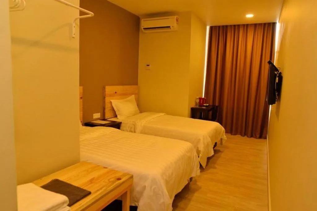 Bed in Sg. Paka Hotel