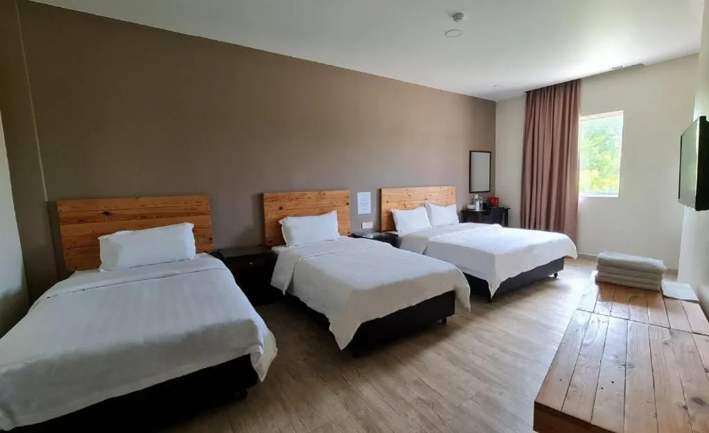 Bed in Sg. Paka Hotel