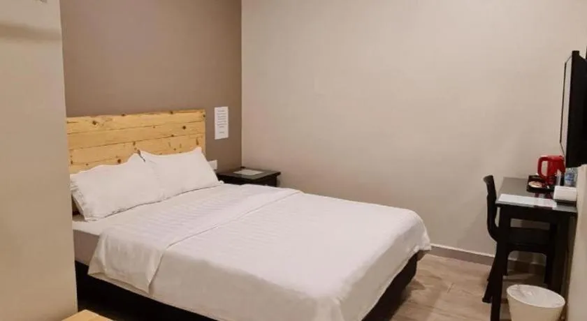 Bed in Sg. Paka Hotel