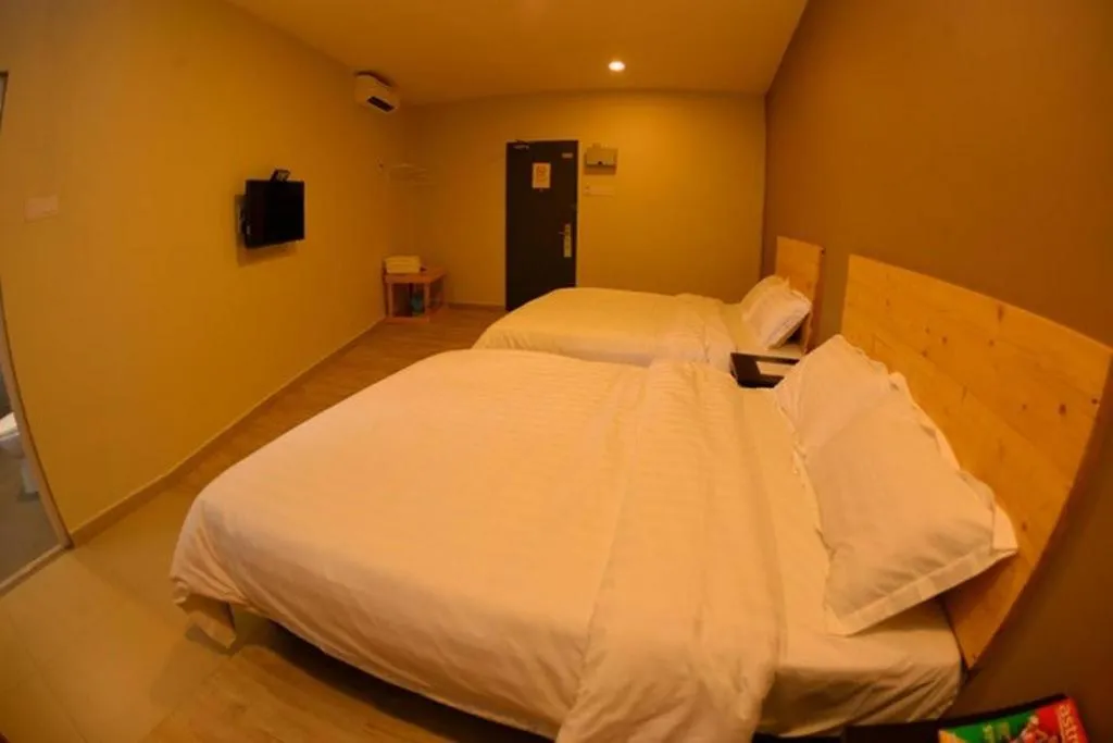 Bed in Sg. Paka Hotel