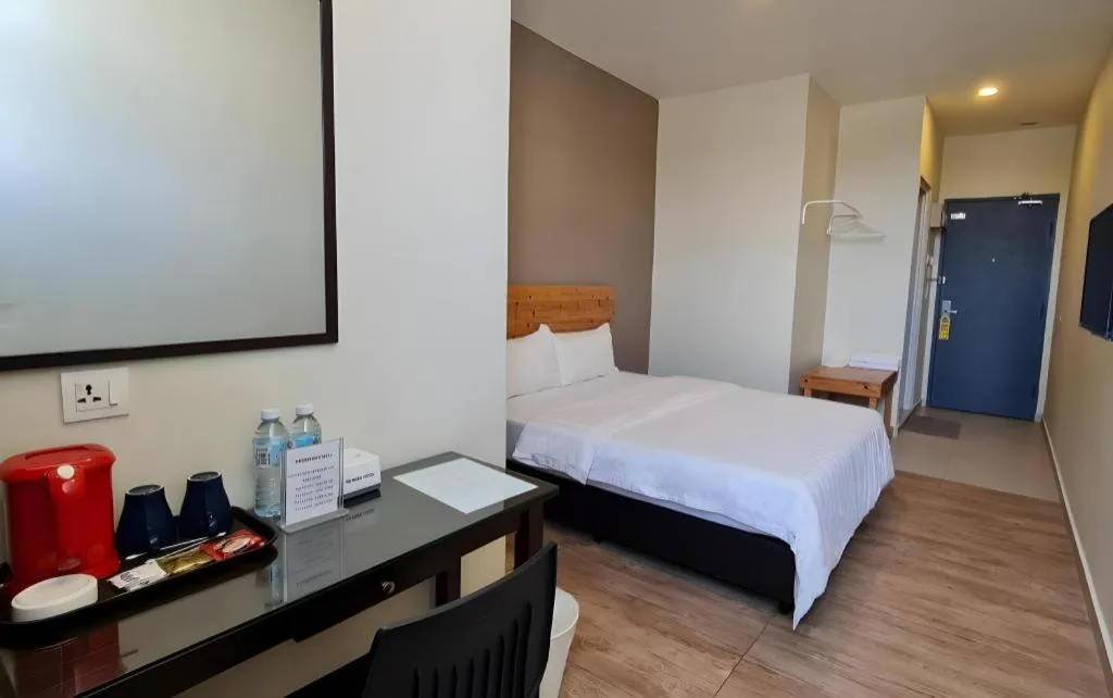 Bed in Sg. Paka Hotel