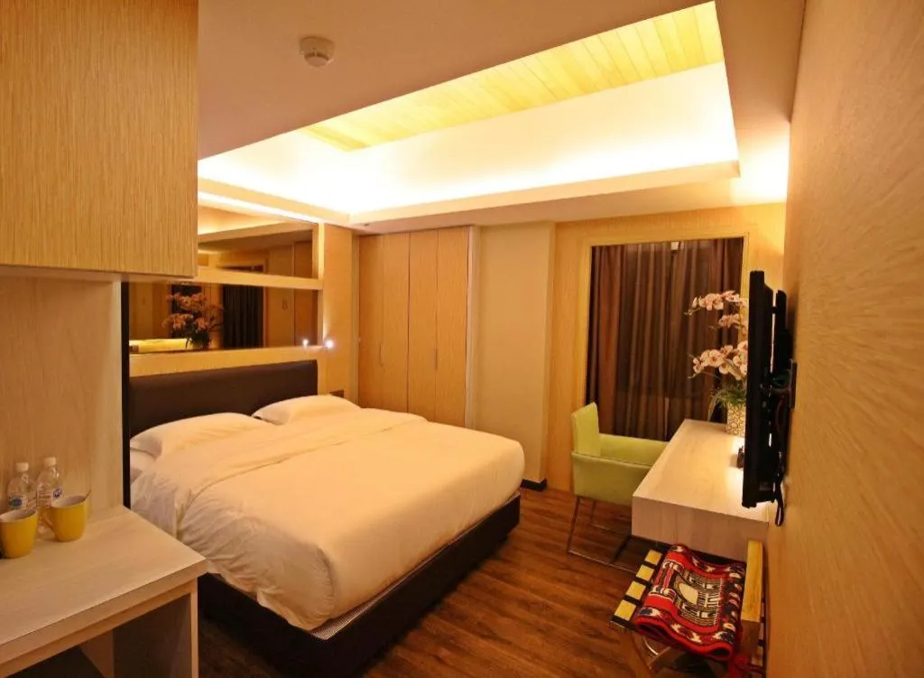 Bed in JC Mark Hotel