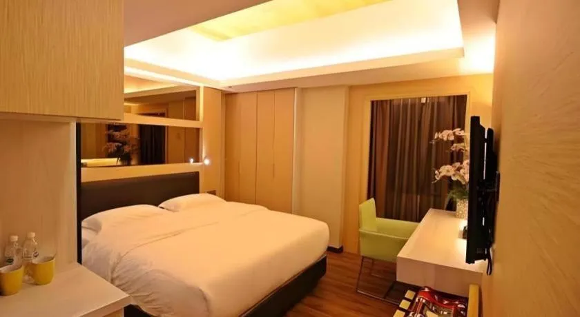 Bed in JC Mark Hotel