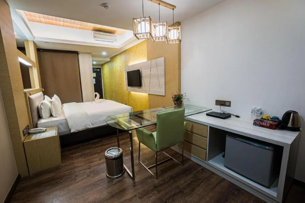 Bed in JC Mark Hotel