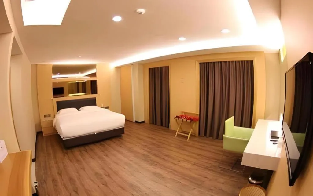 Bed in JC Mark Hotel