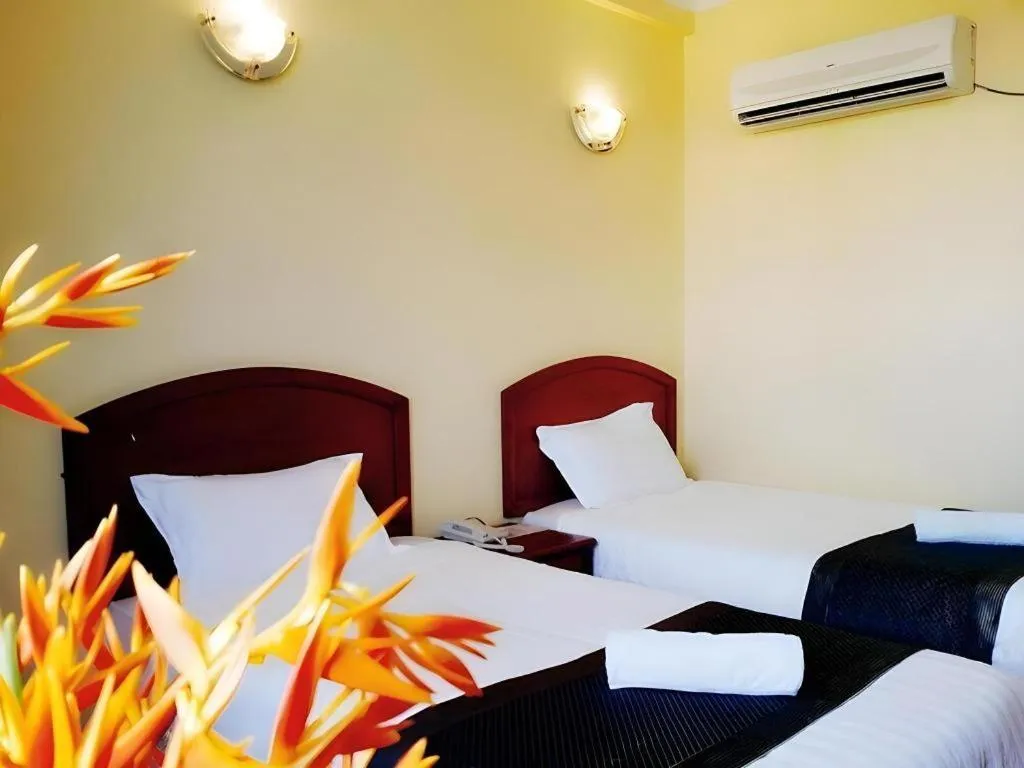 Bed in Global Hotel Labuan