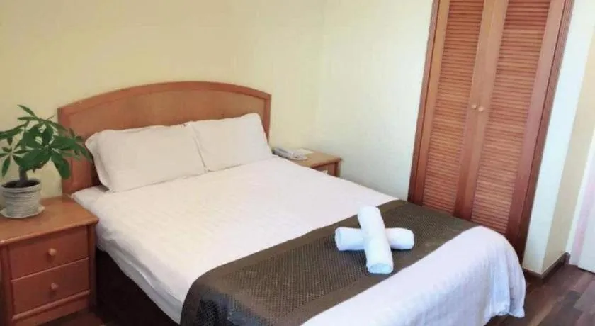 Bed in Global Hotel Labuan