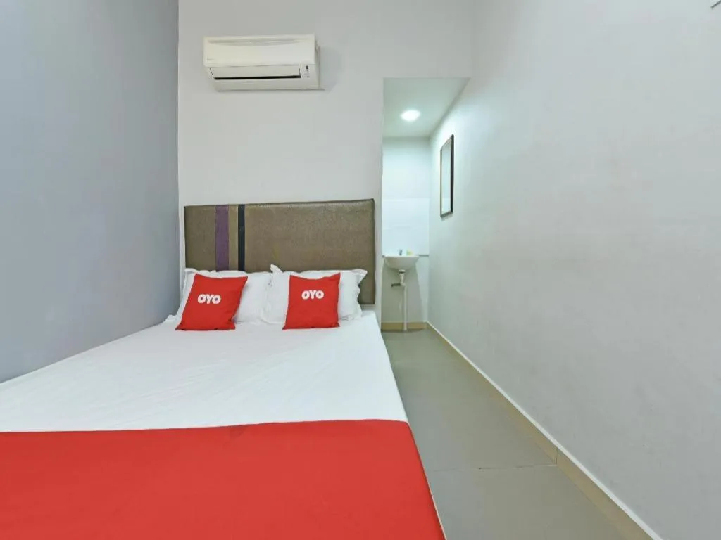 Bed in OYO 90553 Hotel 24 Seven