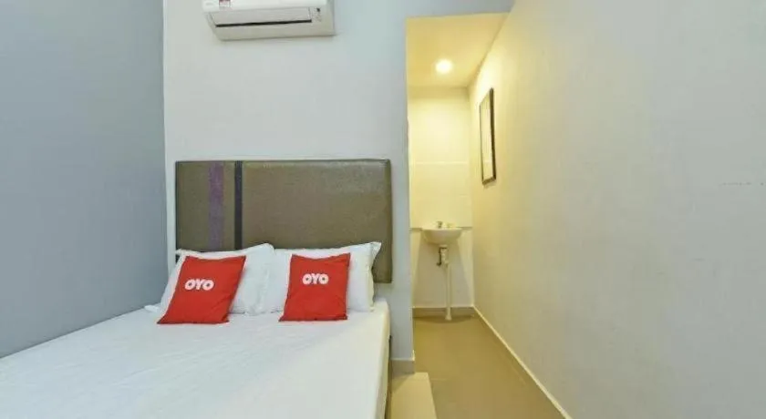 Bed in OYO 90553 Hotel 24 Seven