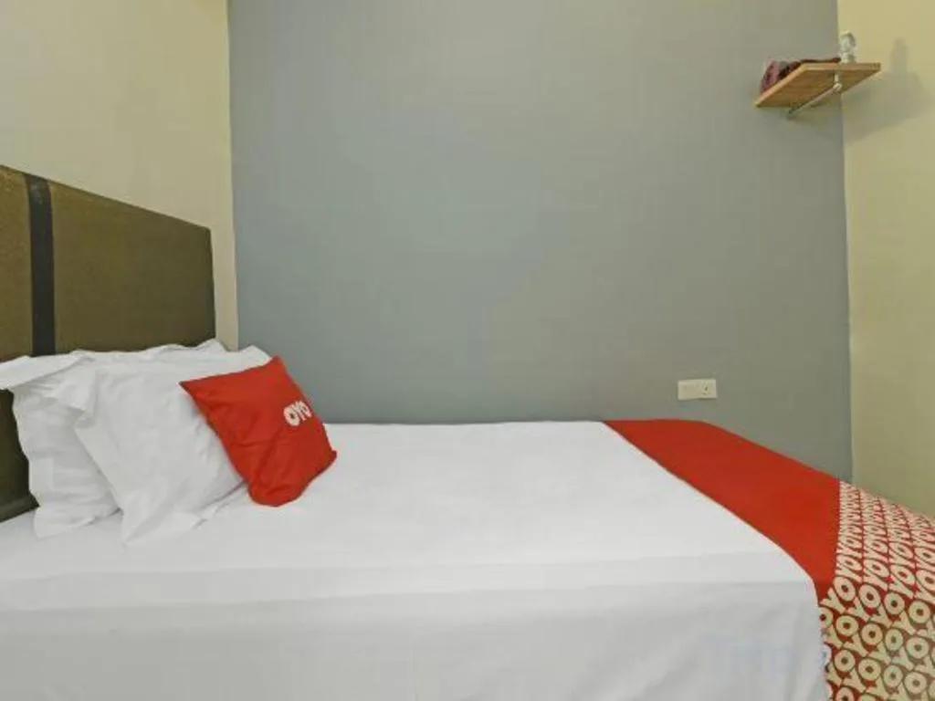 Bed in OYO 90553 Hotel 24 Seven