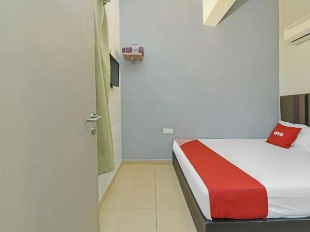 Bed in OYO 90553 Hotel 24 Seven