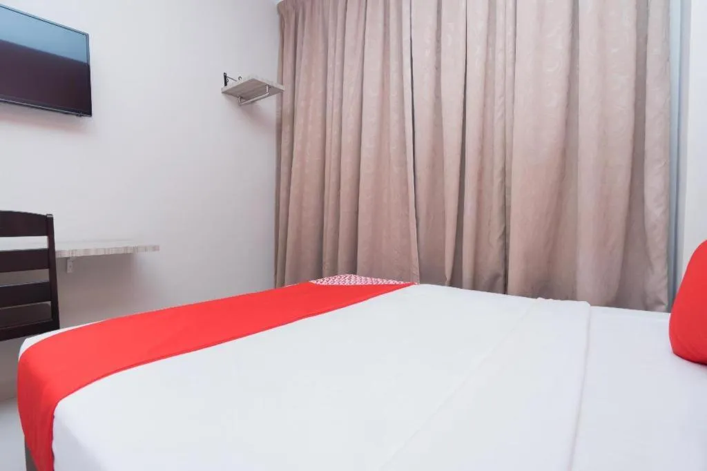 Bed in Capital O 90556 Hotel Cherita Rooms