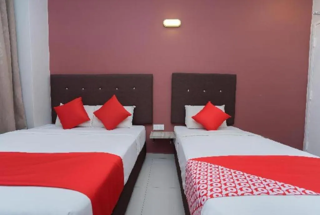 Bed in Capital O 90556 Hotel Cherita Rooms