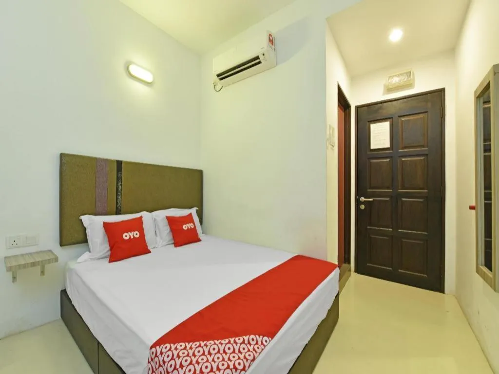 Bed in Capital O 90556 Hotel Cherita Rooms