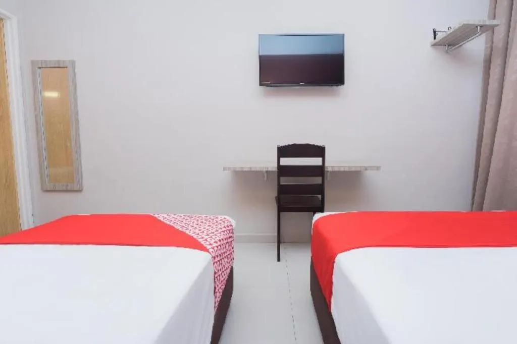 Bed in Capital O 90556 Hotel Cherita Rooms