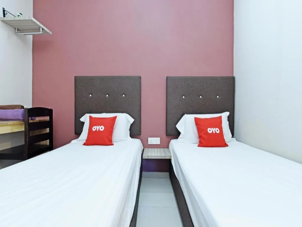 Bed in Capital O 90556 Hotel Cherita Rooms