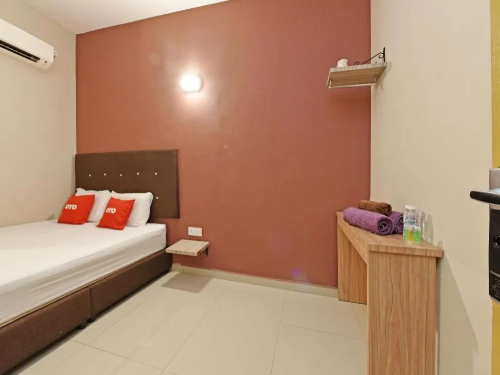 Bed in Capital O 90556 Hotel Cherita Rooms