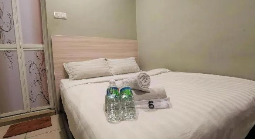 Bed in Pearl Hotel