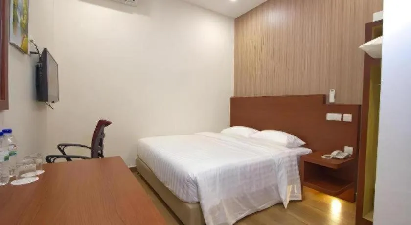 Bed in Elegant Hotel