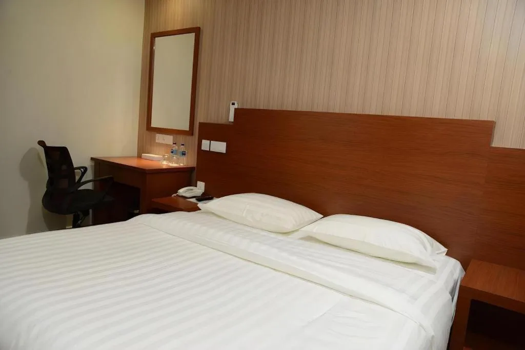 Bed in Elegant Hotel