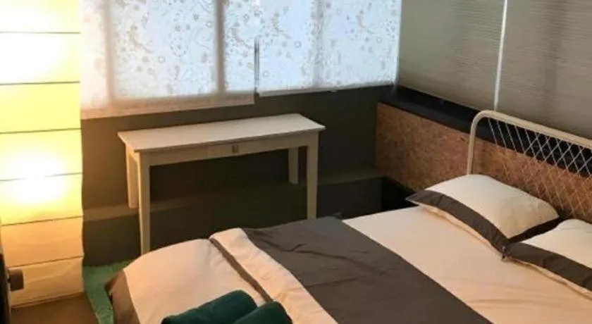 Bed in Koptel Budget Hotel
