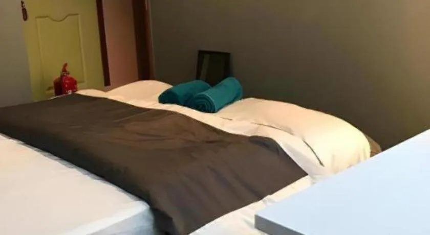 Bed in Koptel Budget Hotel