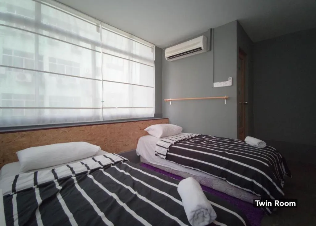 Bed in Koptel Budget Hotel