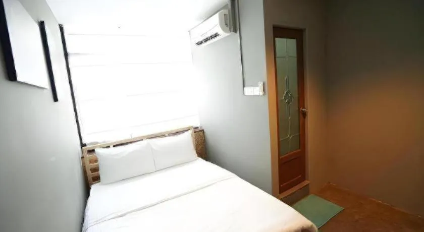Bed in Koptel Budget Hotel