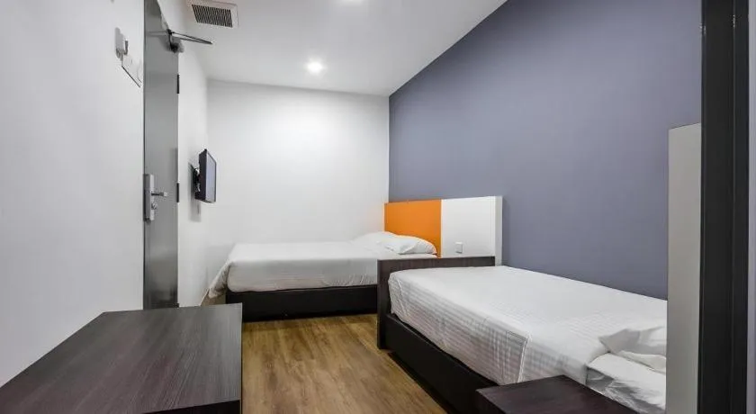 Bed in Big Orange Hotel Jitra