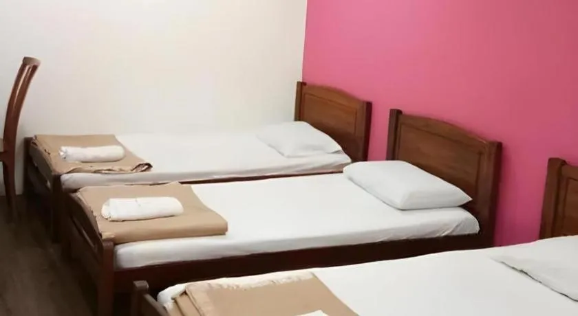 Bed in Twin Star Hotel